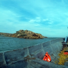 Riding a boat in Bahia Hondita